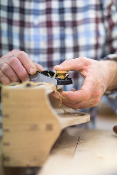 Richard hand finishing a spice tote with a #veritas low angle block plane