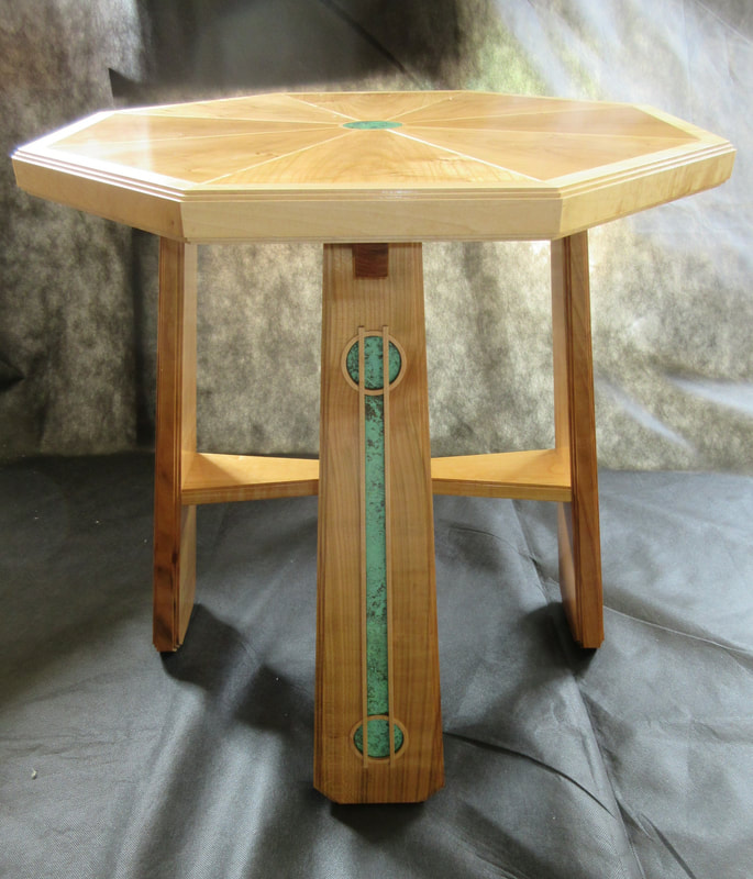 Occasional table in English Cherry, English Maple and Copper.